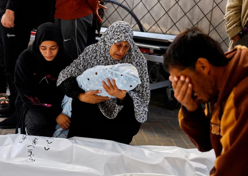 Priests Against Genocide Display Shroud with Names of Gaza’s Child Victims